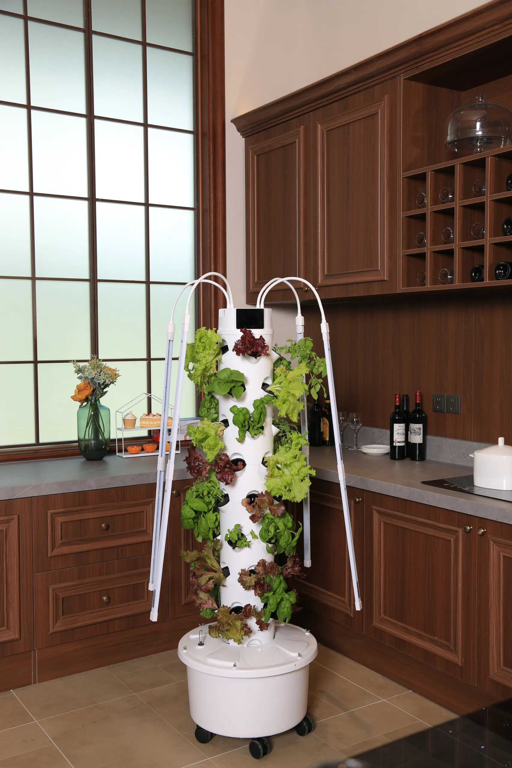 Ovelium 40-Plant Hydroponic Tower growing leafy greens in a kitchen
